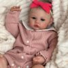 Bambole Reborn Femmine Lydia 5 Bambola Reborn Lydia con braccia snodabili e vestitino rosa a costine