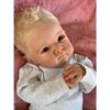 Bambola Reborn Antonio viso ravvicinato capelli biondi platino impiantati