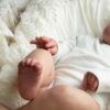 Bambole Reborn Maschio Enzo 3 Bambola Reborn Enzo profilo dormiente su cuscino ricamato